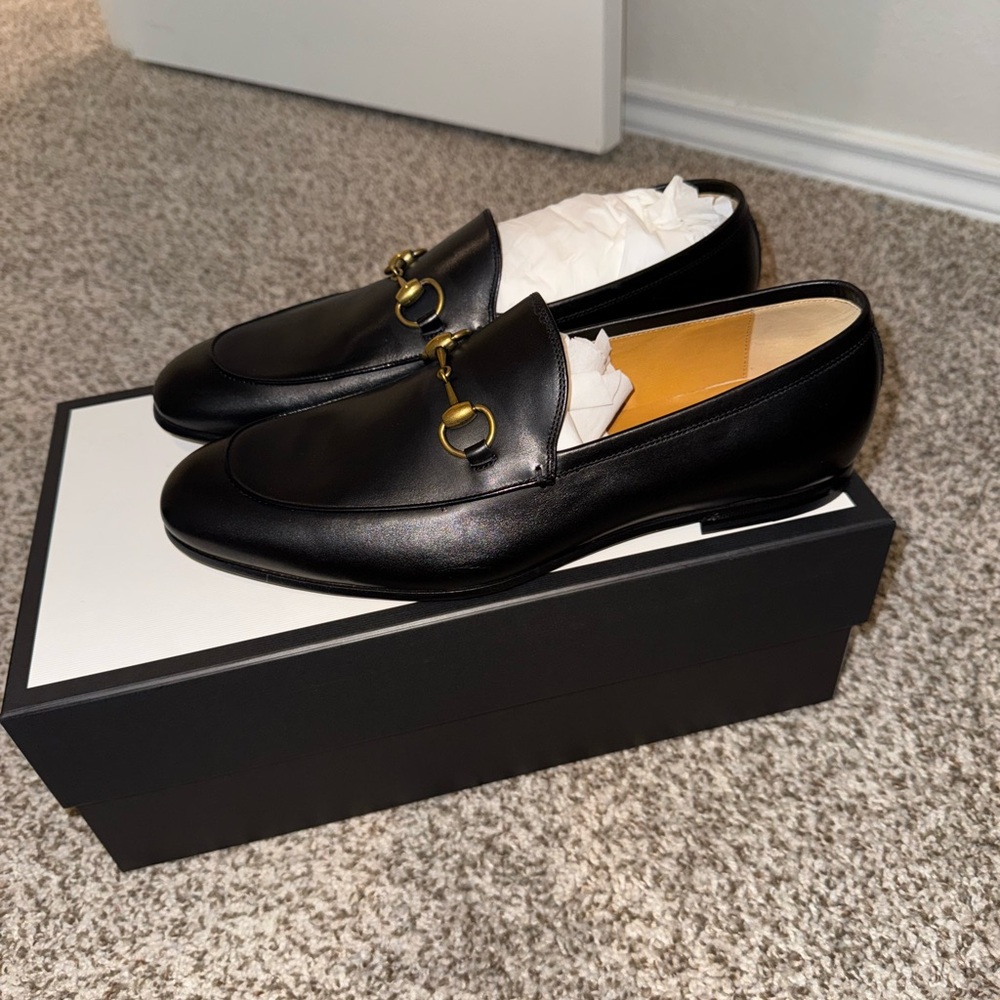 Black Leather Loafers with Gold Detailing